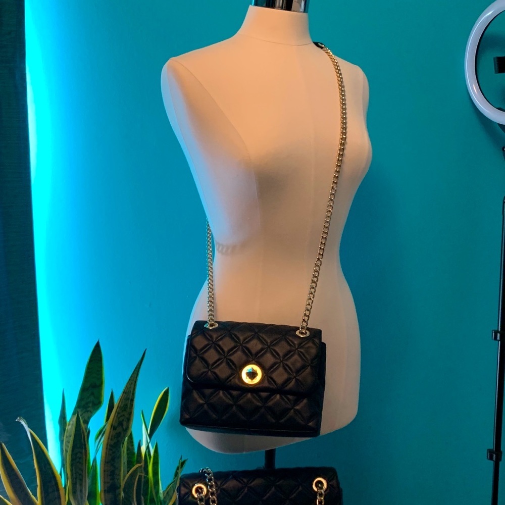 Make me an offer 
 SMALL KATE SPADE SMOOTH QUILTED LEATHER